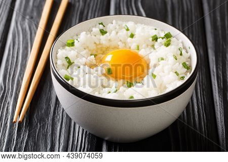 Japanese Breakfast Tamago Kake Gohan Rice Topped With Egg Close Up In The Bowl On The Table. Horizon