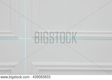 Cross Lines Of Laser Level On White Wall
