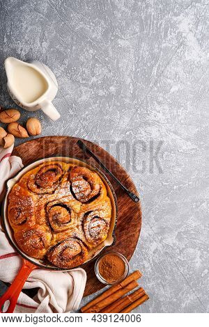 Cinnabon Cinnamon Rolls Buns With Pumpkin, Nut, Caramel And Sugar Cream Iced. Top View. Sweet Homema