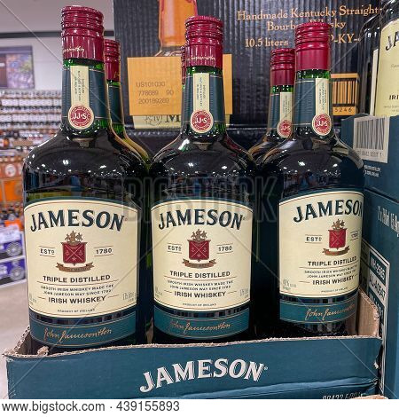 A Display Of Bottles Of Jameson Irish Whiksey  With Background Bokeh At A Binneys Liqour Store In Sp