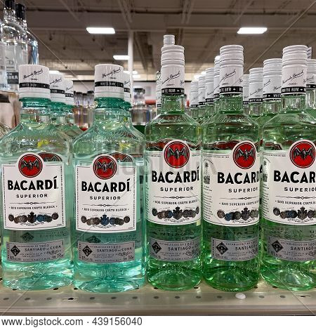 A Display Of Bottles Of Bacardi Rum Superior With Background Bokeh At A Binneys Liqour Store In Spri