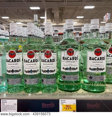 A Display Of Bottles Of Bacardi Rum Superior With Background Bokeh At A Binneys Liqour Store In Spri