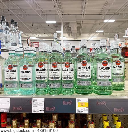 A Display Of Bottles Of Bacardi Rum Superior With Background Bokeh At A Binneys Liqour Store In Spri