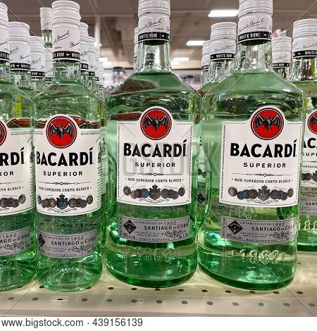 A Display Of Bottles Of Bacardi Rum Superior With Background Bokeh At A Binneys Liqour Store In Spri