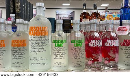 A Display Of Bottles Of  Flavored Absolut Vodka With Background Bokeh At A Binneys Liqour Store In S