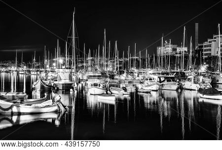 Small Boats Anchored In The Bay At Night, Msida Yacht Marina, Malta