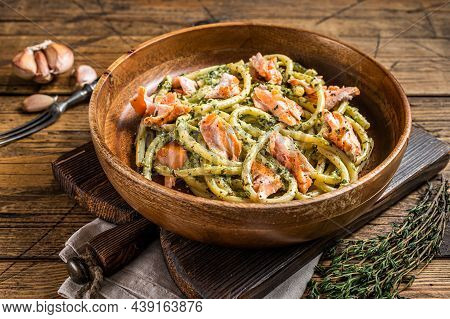 Italian Traditional Pasta Al Salmone, Bucatini Pasta With Smoked Salmon. Wooden Background. Top View