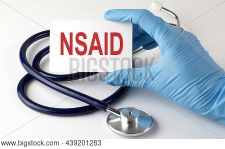 Card With Text Nsaid , Pills, Stethoscope Medical Concept