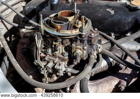 Disassembled Carburetor On Old Engine Without Top And Air Filter. Carburettor Motor Maintenance And 