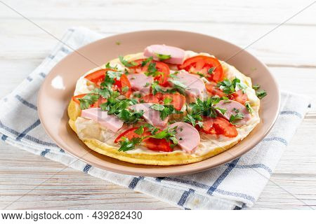 Cooking An Egg Roll. Popular Egg Roll With Cheese And Tomatoes. Selective Focus