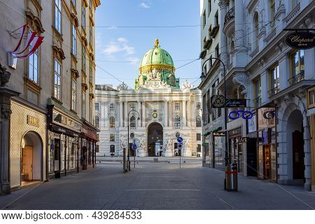 Vienna, Austria - October 2021: Kohlmarkt Shopping Street With Hofburg Palace At Background