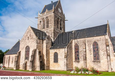 Sainte-mère-Église Church, Normandy, France, October 5, 2019.  Sainte-mère-Église Church With Paratr