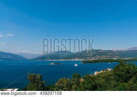 Island Of Otocic Gospa In The Turquoise Bay. Montenegro