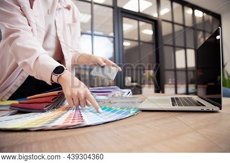 Closeup Decorator, Interior And Graphic Designer, Architect Is Choosing Catalogue Colors Ral For Web
