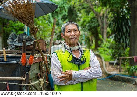 Portrait Happy Old Asian Man Street Cleaner Standing Next To An Old Gabage Cart Before Going To Work