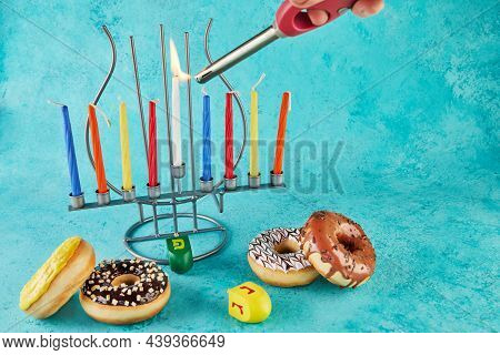 Happy Hanukkah And Hanukkah Sameach - Traditional Jewish Candlestick With Candles, Donuts And Spinni
