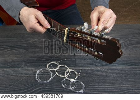 Replacement And Insertion Of Nylon Strings In A Classical Guitar. Lesson For A Musician