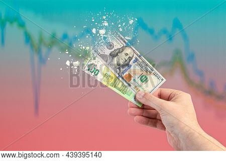 Inflation, Hyperinflation, Stagflation. One Hundred Dollar And One Hundred Euro Banknotes Splatter O