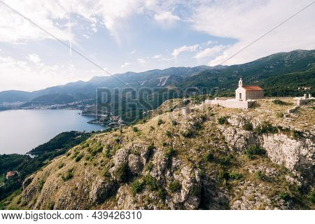 Kotor, Montenegro - 08.06.17: Church Of Sveti Savva On The Mountain Above The Island Of Sveti Stefan