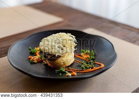 Mushrooms Baked In The Oven With Grated Cheese, Graten.traditional Cheese Casserole, French Cuisine.