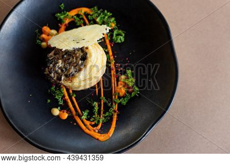 Mushrooms Baked In The Oven With Grated Cheese, Graten.traditional Cheese Casserole, French Cuisine.