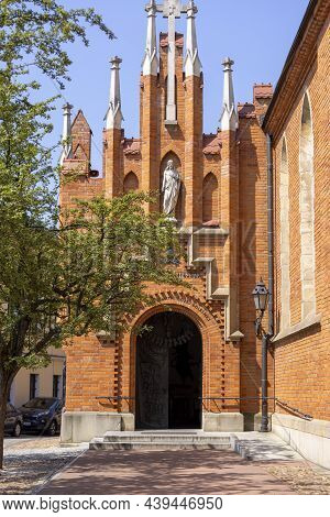 Tarnow, Poland - July 24, 2021: Tarnow Cathedral, 14th Century Church Built Of Red Brick. It Is The 