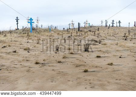 Kuzomen, Tersky District, Murmansk Region, Russia - November 2021, Cemetery. Metal Crosses Covered W