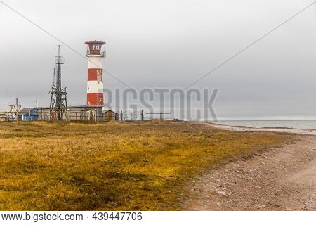 Kashkarantsy, Terskiy District, Murmansk Region, Russia - November 2021. A Working Lighthouse On The