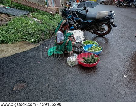 Kolhapur,india- July 14th 2021; Stock Photo Of 50 To 60 Year Old Indian Grandma Wearing Green Color 