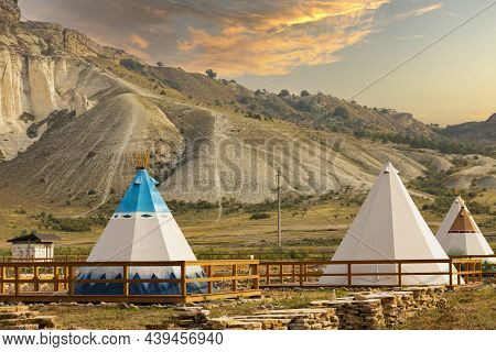 Great View Of The Tipi In The Field With The American Rocky Mountain Landscape In The Background. Hi