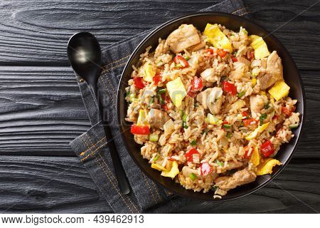 Arroz Chaufa Peruvian Fried Rice Close Up In The Bowl On The Table. Horizontal Top View From Above