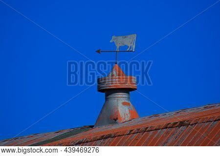 Pretty Weather Vane On The Roof Of A Barn In The Canadian Countryside In Quebec