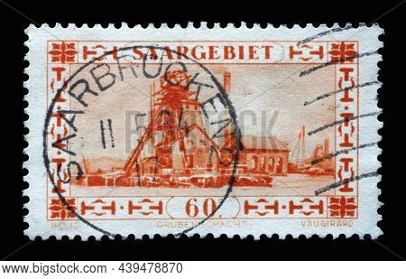 ZAGREB, CROATIA - JULY 02, 2014: Stamp from Germany area Saar shows industrial landscape of the mining industry, circa 1930