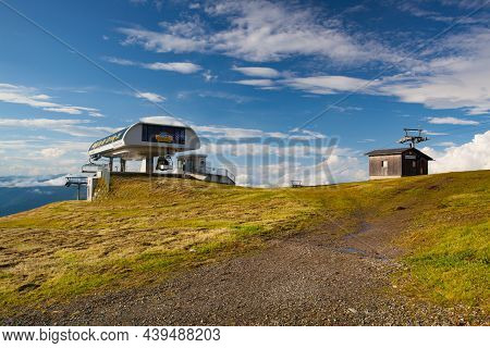 Treffen, Austria - August 17,2016: Summer Ski Resort In Gerlitzen Alps. Ski Lift On The Top In Heigh