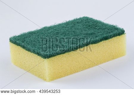 Yellow Kitchen Sponge Against On White Background. Scrub Yellow Sponge Design, Close Up Cleaning Spo