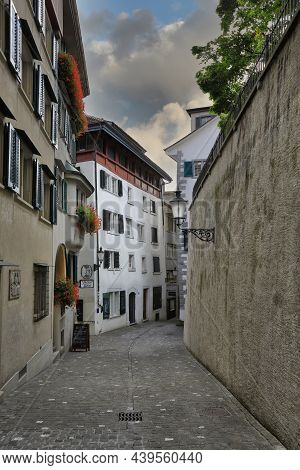 Zurich, Switzerland - September 15, 2021. Narrow Cobbled Pedestrian Streets Of Historical Center. Ci