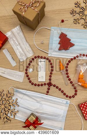 Christmas Decoration And Covid Test With Mask On Table