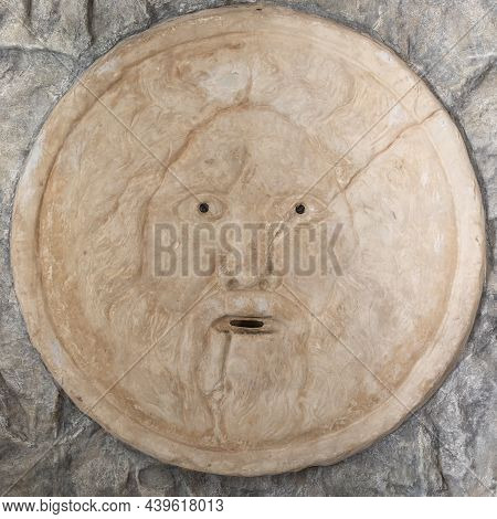Mouth Of Truth Sightseeing In Rome, Italy. Historical Sculpture Made Of Marble With Antique Face Ful