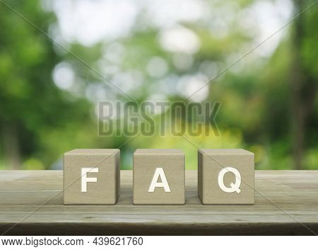 Faq Acronym On Wood Block Cubes On Wooden Table Over Blur Green Tree In Park, Frequently Asked Quest