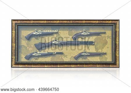 Di Cut A Photo Frame Of 5 Ancient Guns Hang On The World Map Background,wall,object,decoration,copy 