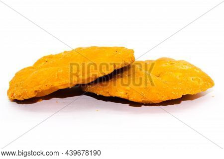 Crispy And Salty Mathri On White Background With Selective Focus