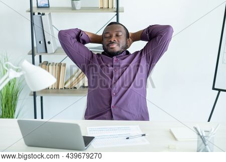 Work Rest. Chealing Man. Take Pause. Happy Guy Sitting Back Office Chair With Laptop Documents On De