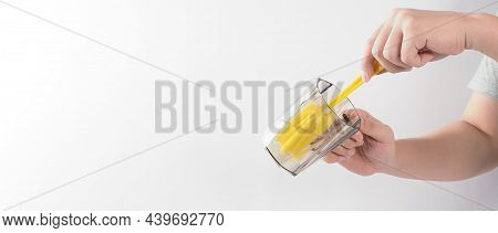 Clean And Wash Dish Concept. Man Hand Washing Drink Glass On White Background.