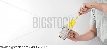 Clean And Wash Dish Concept. Man Hand Washing Drink Glass On White Background.