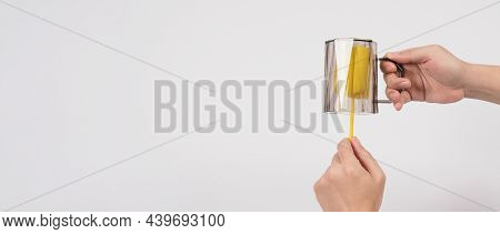 Clean And Wash Dish Concept. Man Hand Washing Drink Glass On White Background.