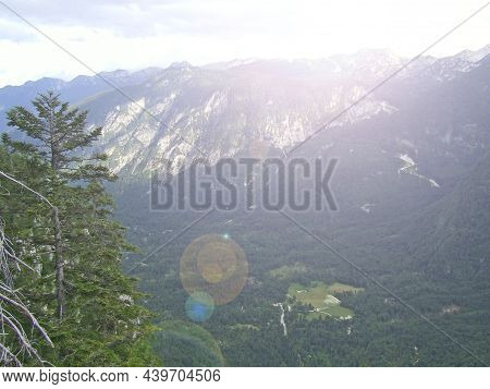 Mountain Landscape. Railway Transport In Mountains. Landscape With Mountains Covered With Green Fore