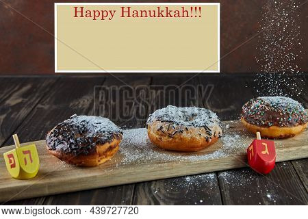 Happy Hanukkah And Hanukkah Sameach - Traditional Jewish Donuts, Spinning Tops With Pouring Powdered