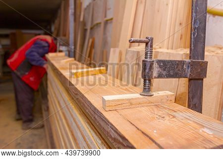 Process Of Drying Glue In The Manual Production Of Wooden Profiles In Carpentry. Clamp Tool For Fixi