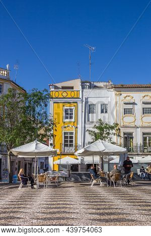 Elvas, Portugal - October 22, 2021: People Anjoying The Sun At A Cafe On The Market Square Of Elvas,