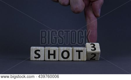 Covid-19 Booster Dose Vaccine Shot Symbol. Doctor Turns Cubes And Changes Words 'shot 2' To 'shot 3'